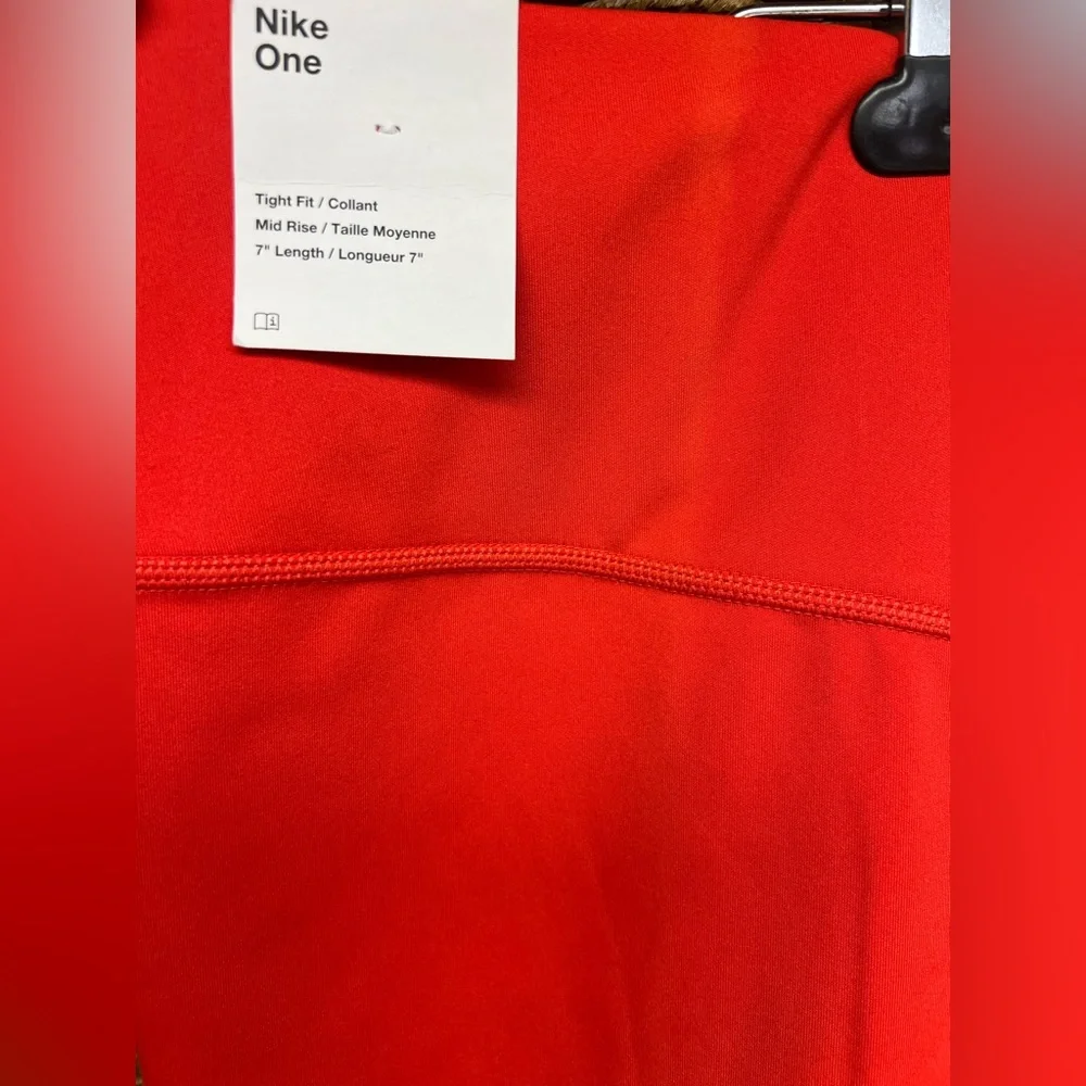 Nike Women's Red Shorts-XXL, tags, sun fade lines ( please see images).‎